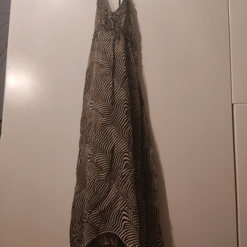 Tiger print dress used, backless, size M