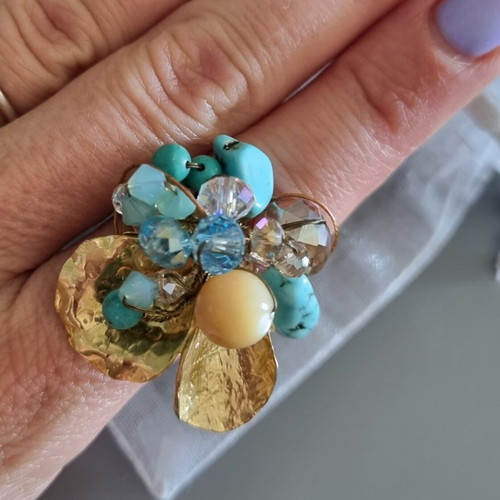 Handmade ring new with adjustable size, blue and gold colors