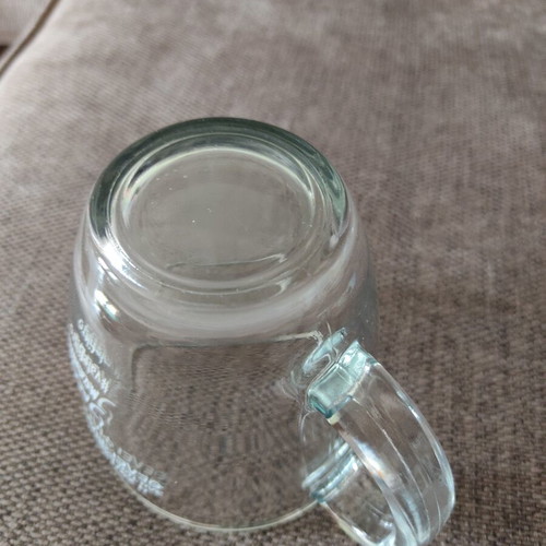 Jacobs glass mug new, heat resistant with printed message