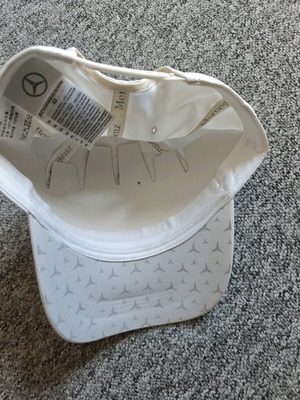 White cap Mercedes Benz
