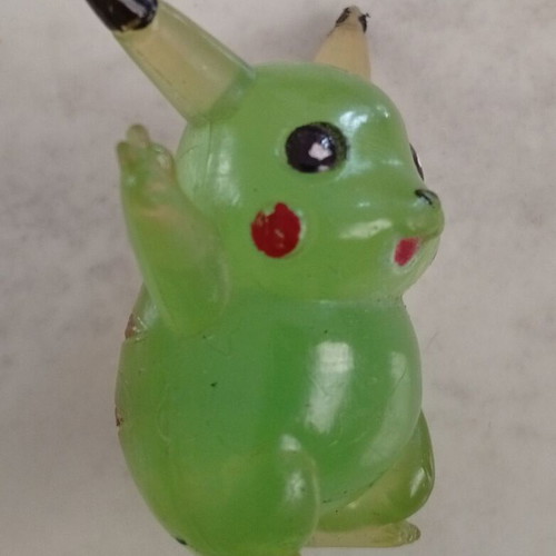 Vintage Pikachu figure miniature, clear green bootleg