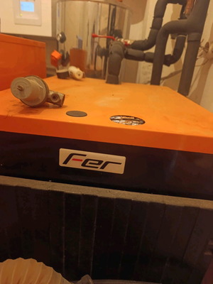 Ferroli pellet boiler like new with 300 kg tank and 49,000 btu burner