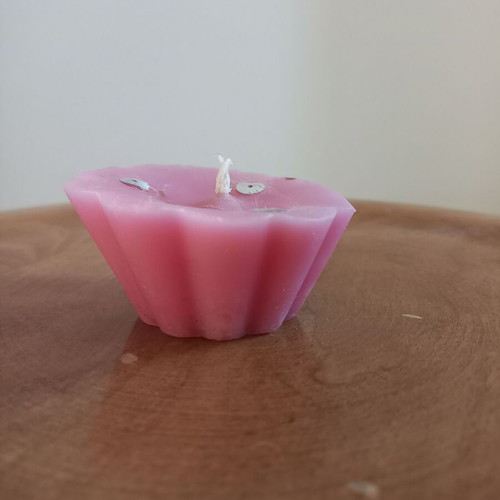 Pink candle like new, flower shape, light rose scent