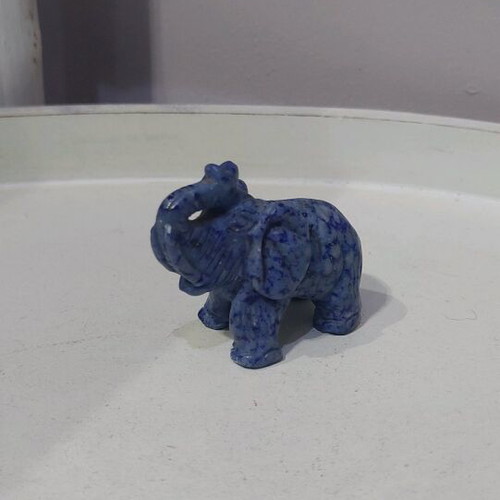 Decorative elephant carved from natural blue stone like new