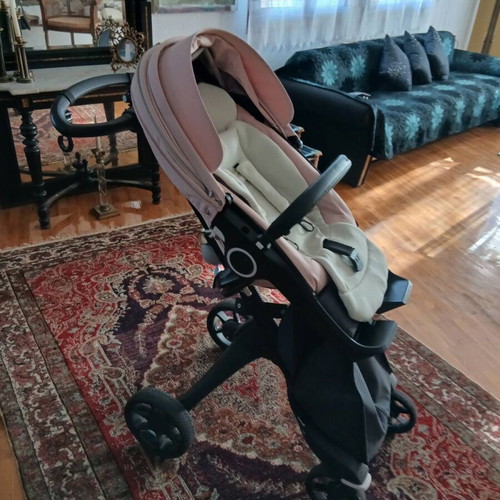 Stokke limited edition baby stroller used, soft pink with pistachio details
