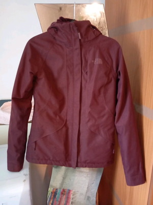 The North Face women's jacket xsmall like new, burgundy with fur lining