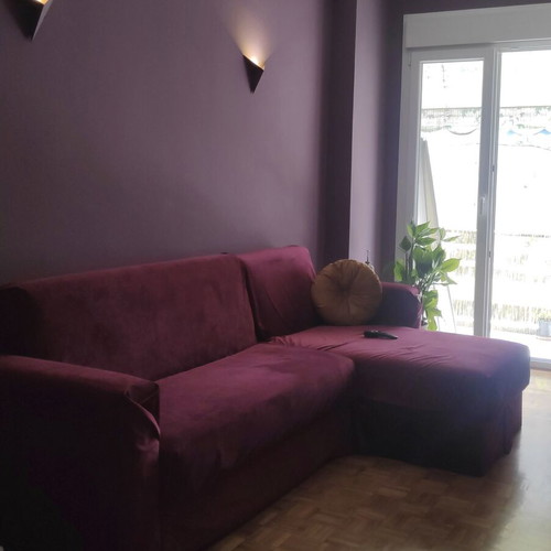 Corner sofa bed used with storage and removable burgundy cover