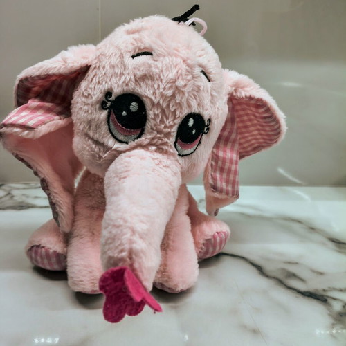 Pink plush elephant like new with embroidered eyes and hanging loop
