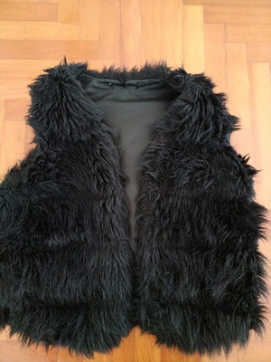 Faux fur sleeveless jacket black used
