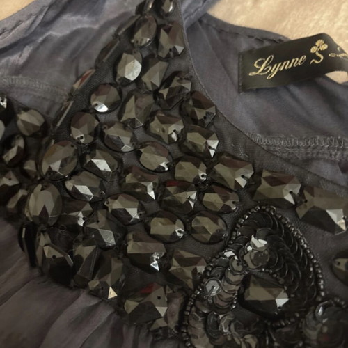 Lynne babydoll evening dress with beaded neckline, charcoal grey