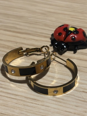 Hoop earrings like new, gold and black with rhinestones