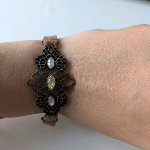 Bracelet with leather strap like new with metal clasp and rhinestones