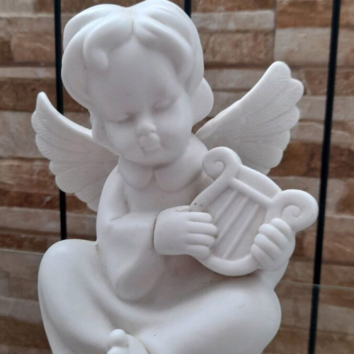 White angel figure ceramic used