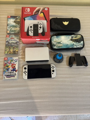 Nintendo Switch OLED κονσόλα μεταχειρισμένη με 3 παιχνίδια και θήκες Zelda
