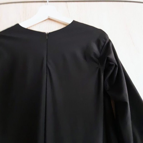 Black dress with beige lining and cutouts by Zero Waist Daniel