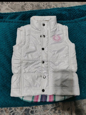 Sprider children's sleeveless jacket like new, white