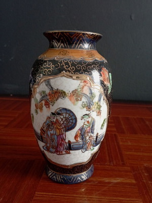Vintage vase from China used with flowers and figures