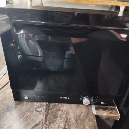 Bosch countertop dishwasher used, 6 place settings, black