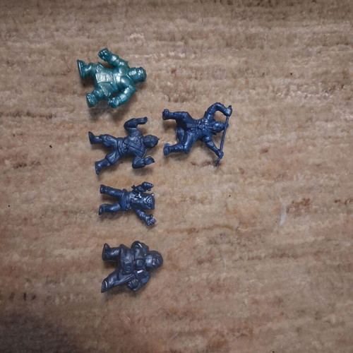 Ninja figure set used, 4 dark blue and 1 turquoise