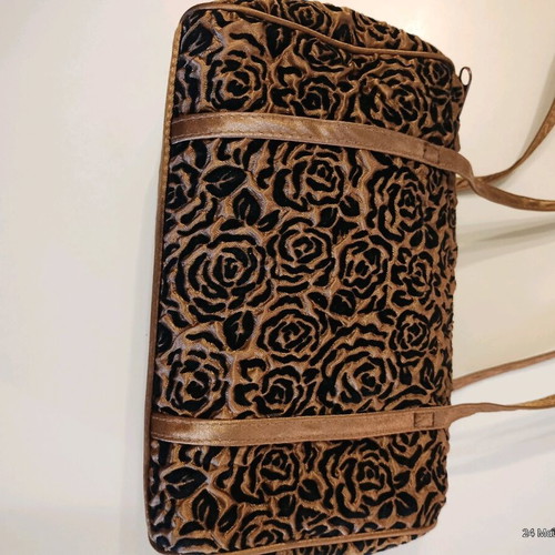 Satin handbag new, black with gold embossed patterns