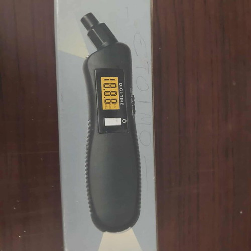 Digital tire pressure gauge in box