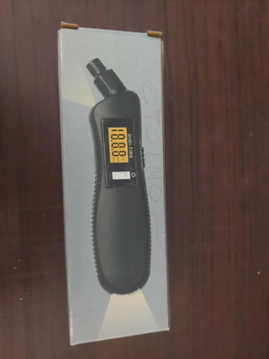 Digital tire pressure gauge in box