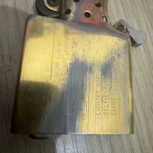 Zippo lighter with red stripe, like new, needs refill and flint