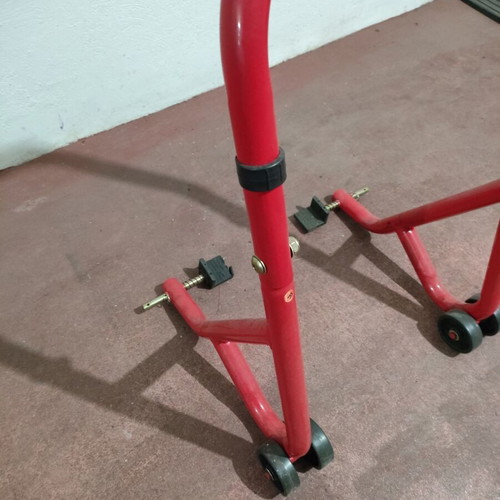 Motorcycle rear stand new with four wheels