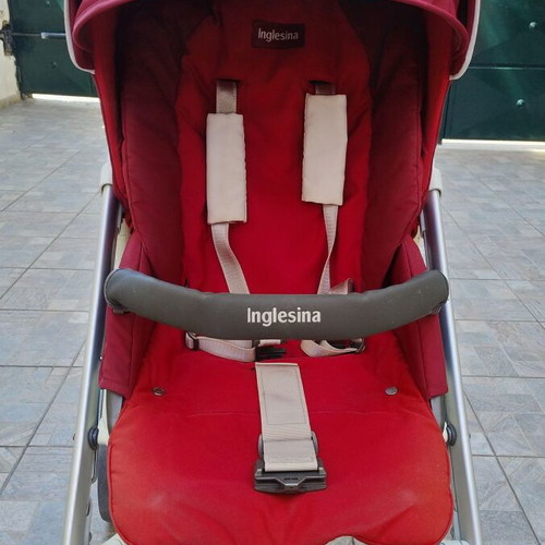 Inglesina Trilogy stroller used with extras and rain cover