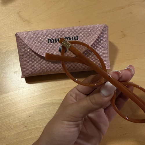 Miu Miu round orange sunglasses
