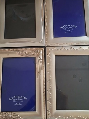 Silver plated photo frames like new, set of 4