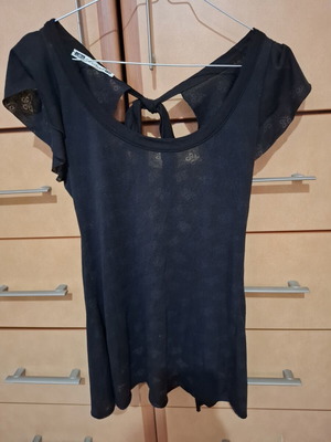 Backless blouse like new, black, with light transparency and embossed designs