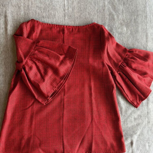 Red blouse with check pattern and dramatic sleeves, like new, size S