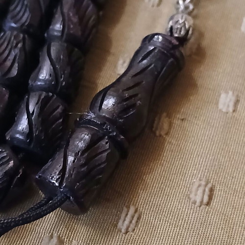 Komboloi bone engraved worry beads used with metal elements and tassel