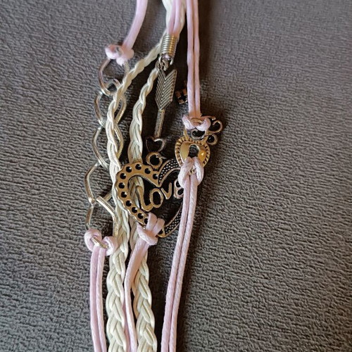 Love bracelet set new with white and pink cords and charms