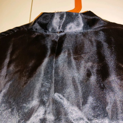 2 women's robes like new, one cream and one black with flower detail