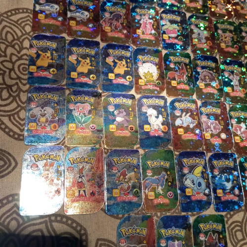 Pokemon metal tags like new, 43 pieces