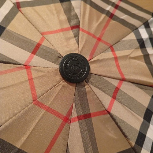 Burberry folding umbrella and Johnstones of Elgin cashmere scarf used