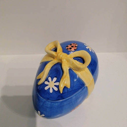 Vintage ceramic egg like new with lid and decorative details