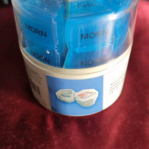 Rotating plastic weekly pill organizer new medication storage device