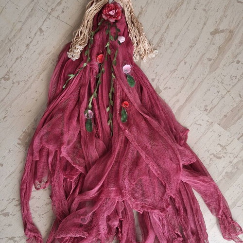 Handmade decorative wall doll with ceramic face and burgundy dress