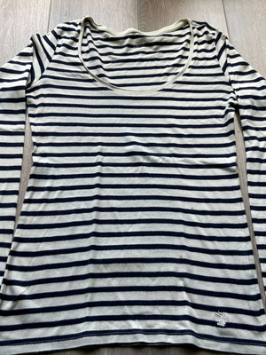 Women's top like new, blue and white patterned, size L