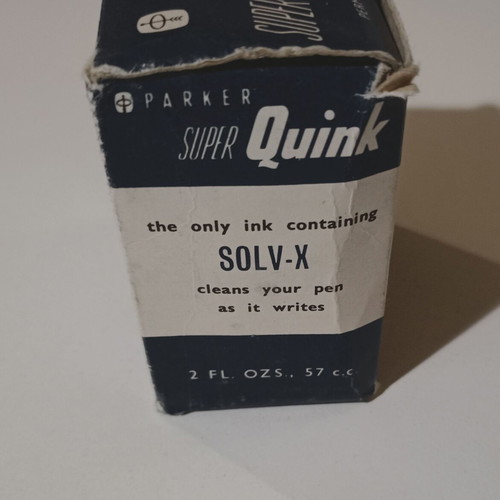 Permanent blue ink "PARKER - SUPER QUINK", in a glass bottle in its box, I think it is full.