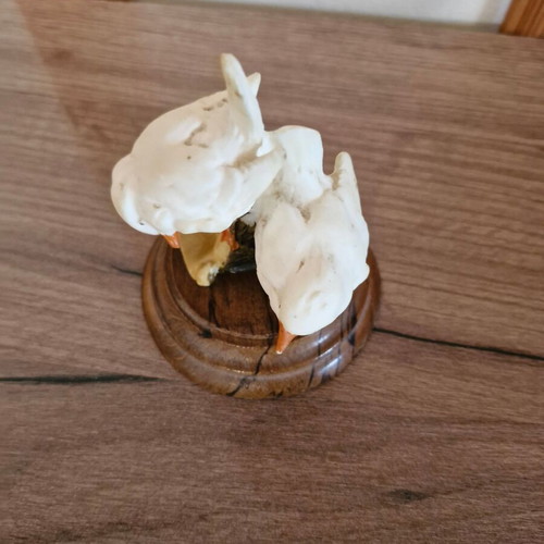 Figurine with doves on wooden base used