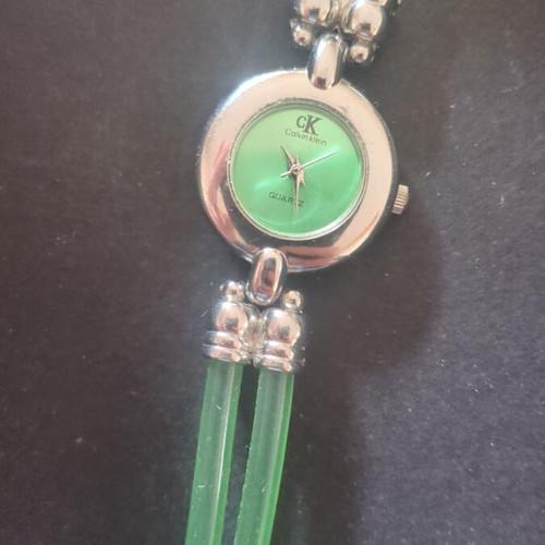 Calvin Klein wristwatch used, green and silver