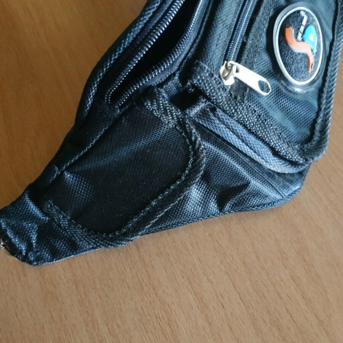 Men's waist bag like new, missing cord
