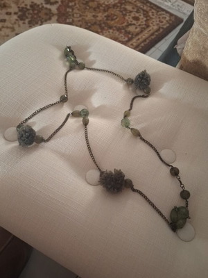 Long necklace like new with green tassels and stones