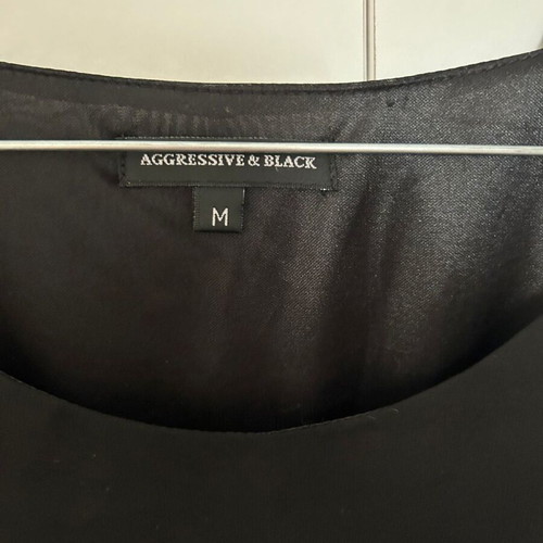 Mini black dress like new, size medium