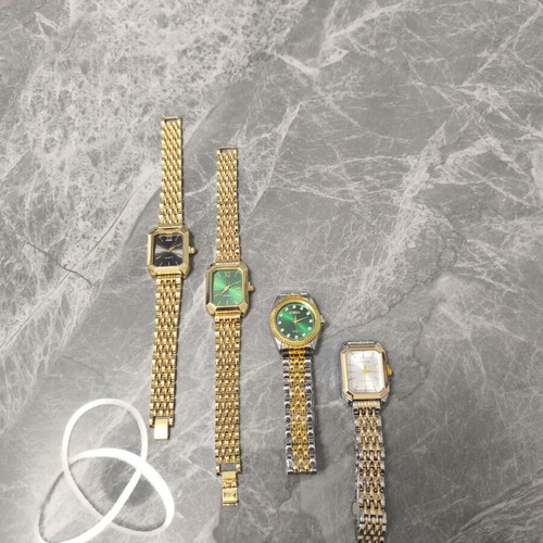 Set of 4 new women's gold watches