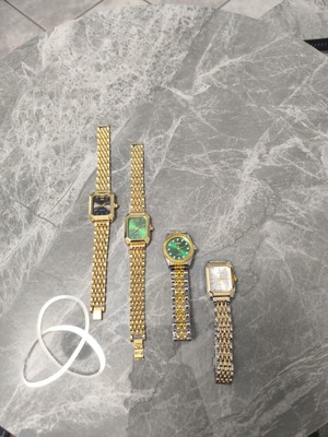 Set of 4 new women's gold watches